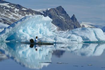 OCEAN CULTURE: A man kayaks in the icy waters of Greenland. Fishing has traditionally been the at the heart of the country's economy. (Kristian Fridriksson/Greenland Tourism) OCEAN CULTURE: A man kayaks in the icy waters of Greenland. Fishing has traditionally been the at the heart of the country's economy. (Kristian Fridriksson/Greenland Tourism)