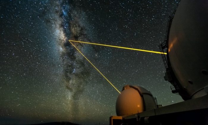 http://newsroom.ucla.edu/portal/ucla/news.aspx The two W. M. Keck Telescopes in Hawaii observing the galactic center. Using the adaptive optics technique, the lasers create an artificial star in the Earth’s upper atmosphere, which allows measurement of the lower atmosphere's blurring effects (that makes stars twinkle in the night sky). The blurring gets corrected in real time with the help of a deformable mirror. (Ethan Tweedie)
