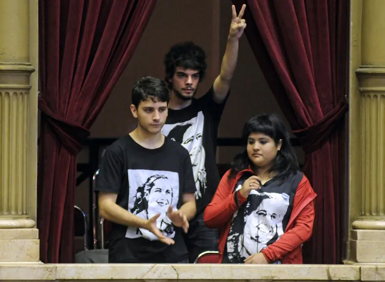 Argentinian youth attend a session of the Chamber of Deputies during the debate for a law that would authorize 16 and 17 year-olds to vote, in Buenos Aires on Oct. 31, 2012. (Hugo Villalobos/AFP/Getty Images)
