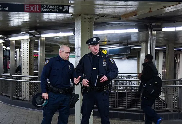 New York Police officers start their shifts in Manhattan's Times Square subway on Feb 23. (Benjamin Chasteen/The Epoch Times)