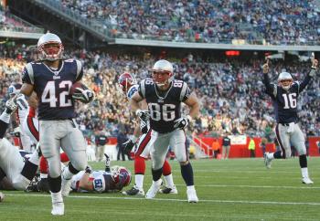 FINALLY! BenJarvus Green-Ellis caps a 19-play drive in the fourth quarter with a short TD-run. (Elsa/Getty Images)