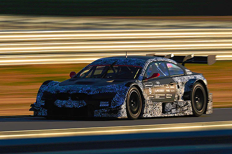 BMW’s DTM M3 roars around the Monteblanco test track. BMW is returning to DTM for the first time since 1996. (BMW Motorsport)