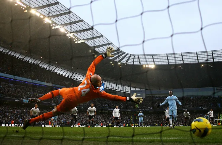 Tottenham’s Gareth Bale celebrates his equalizing goal against Manchester City on Sunday. (Paul Ellis/AFP/Getty Images)