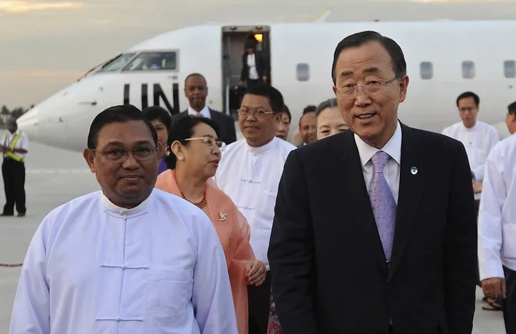 United Nations Secretary-General Ban Ki-moon (C) is greeted upon his arrival by Myanmar's Foreign Minister, U Wunna Maung Lwin (L) at the Naypyidaw International airport in Naypyidaw on 29 April. (Soe Than WIN/AFP/GettyImages)