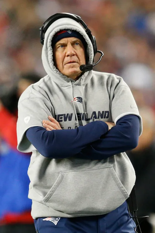 Bill Belichick's Patriots have missed the playoffs just three times since he took over in 2000. (Jim Rogash/Getty Images)