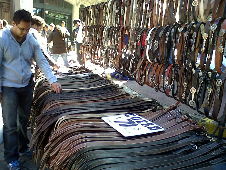 A street vendor displays his belts at the San Telmo market in Buenos Aires. (Michele Goncalves/ The Epoch Times)