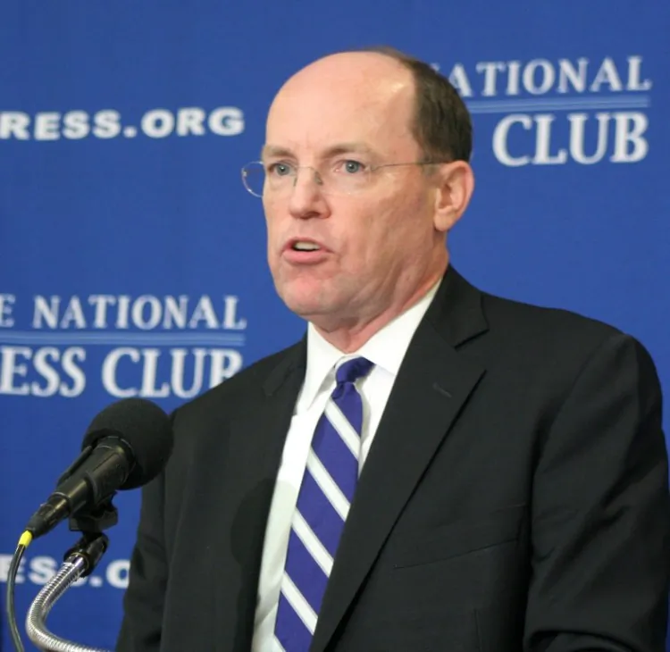 Dennis M. Kelleher, CEO of Better Markets, Inc. details the cost of the 2007-2008 financial crisis at a National Press Club Newsmaker event in Washington, Sept. 15. Kelleher measures the cost of the Great Recession in terms of lost wealth due to reduced GDP, unemployment, stock market losses, housing value declines, government bailouts, and economic hardship. (Gary Feuerberg/The Epoch Times)