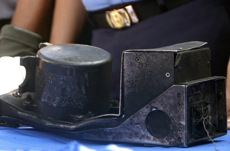 The charred cockpit voice recorder of the Russian Sukhoi Superjet 100 is seen on a table during a turnover ceremony to the Indonesian investigating body at the search and rescue base in Cijeruk on May 16. (AFP/AFP/GettyImages)