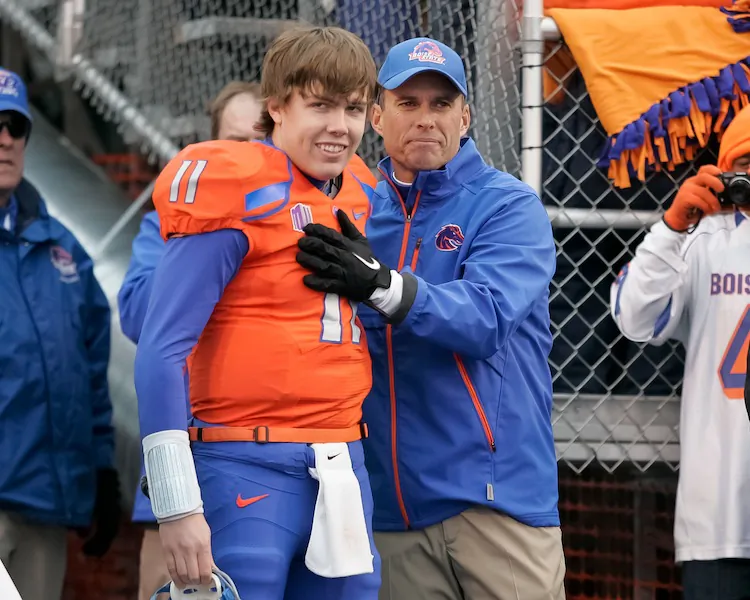 Boise State and coach Chris Peterson (left) will join the Big East. (Otto Kitsinger III/Getty Images)