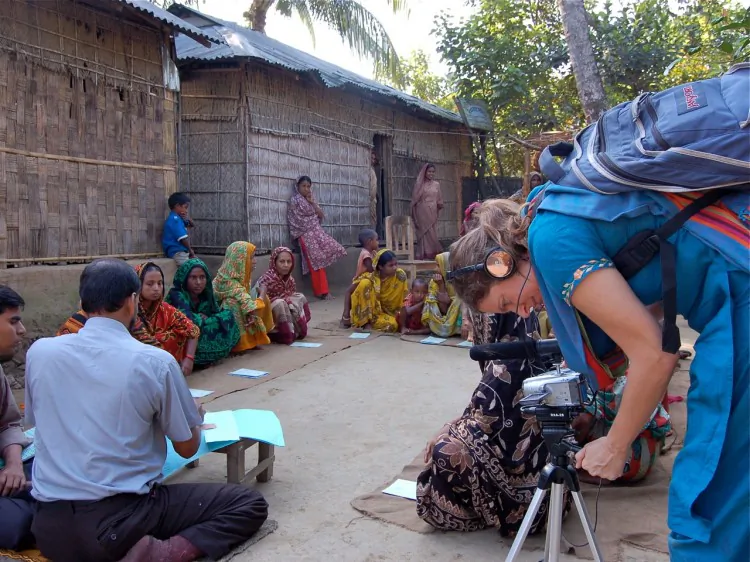 Aroti (R), after establishing herself with the help of Grameen Bank, has become a successful entrepreneur and is now active in promoting women's rights. (Courtesy of Hummingbird Pictures )