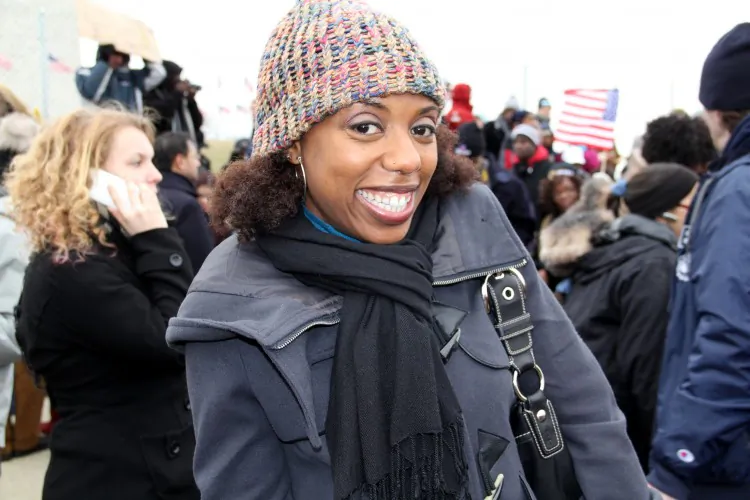 Toni Thomas (M) and Corey Chambers (R) came from New Jersey to witness President Barack Obama’s inauguration ceremony on Monday, Jan. 21, 2013. (The Epoch Times)