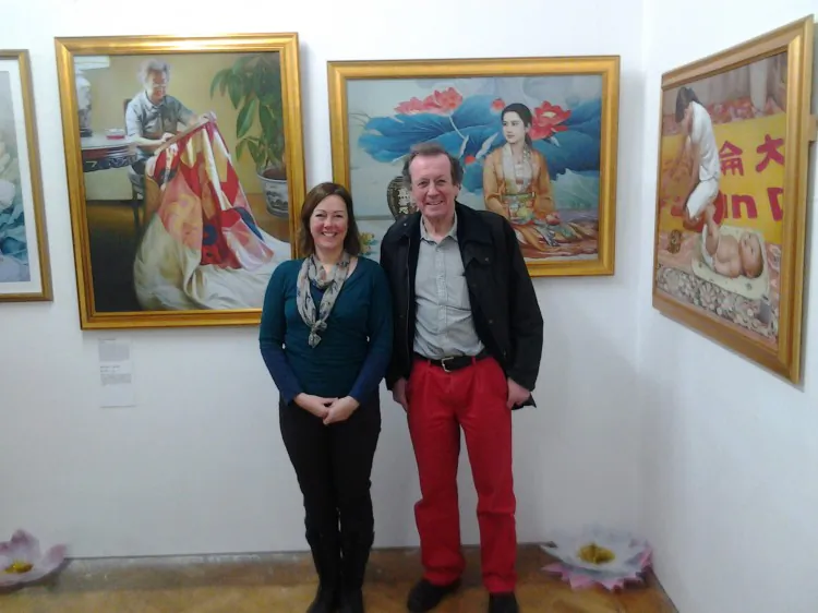 Rebecca James with the Mayor of Bristol, George Ferguson, at the Island Gallery exhibition of The Art of Zhen Shan Ren (Truth, Compassion and Forbearance). (The Epoch Times)