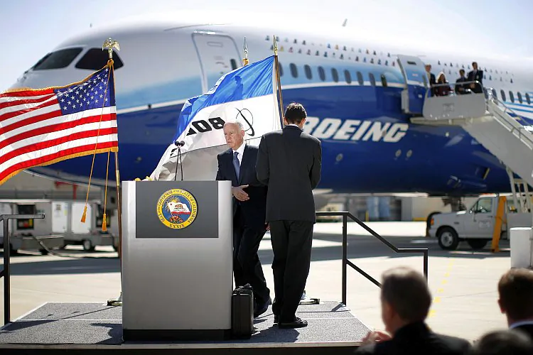 California Gov. Jerry Brown steps to the podium to speak at a presentation of the new Boeing 787 Dreamliner passenger jet, March 14 in Long Beach, Calif. (David McNew/Getty Images)