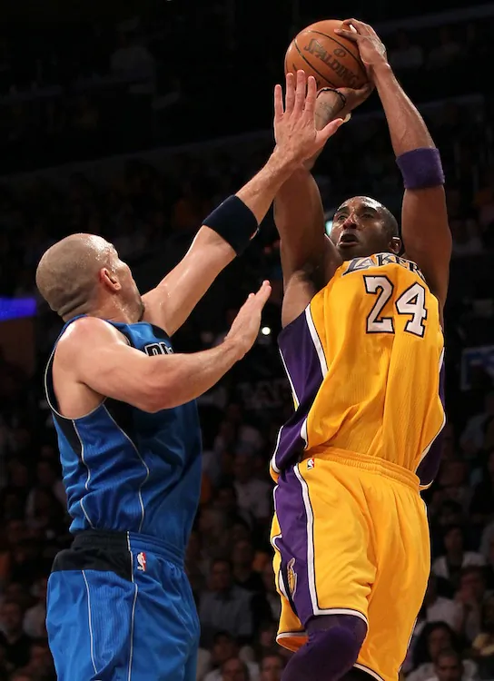 Kobe Bryant and the Lakers open the season with three straight games. (Stephen Dunn/Getty Images)