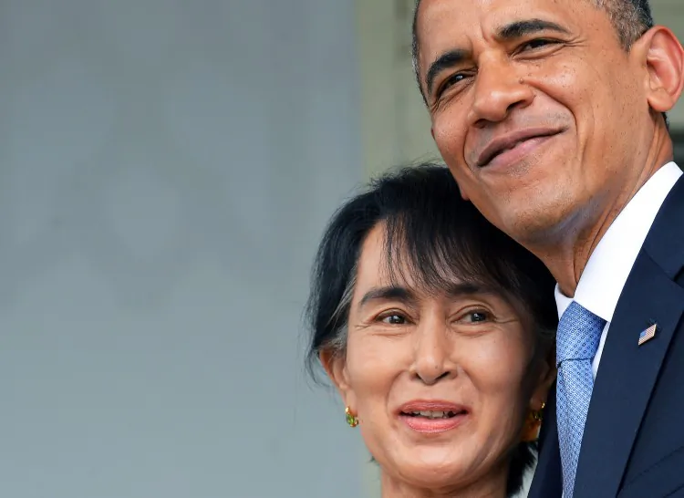 U.S. President Barack Obama hugs Burmese democracy icon and opposition leader Aung San Suu Kyi (L) as they leave after making a speech at her residence in Yangon, Burma, on Nov. 19, 2012. Obama's historic visit to Yangon aimed to encourage political reforms. (Jewel Samad/AFP/Getty Images)