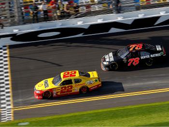 Kurt Busch in the #22 Shell Pennzoil Dodge, crosses the finish line ahead of Regan Smith in the #78 Furniture Row Racing Chevrolet to win the first NASCAR Sprint Cup Series Gatorade Duel at Daytona. (Todd Warshaw/Getty Images for NASCAR) Kurt Busch in the #22 Shell Pennzoil Dodge, crosses the finish line ahead of Regan Smith in the #78 Furniture Row Racing Chevrolet to win the first NASCAR Sprint Cup Series Gatorade Duel at Daytona. (Todd Warshaw/Getty Images for NASCAR)