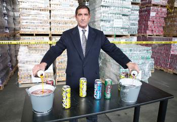 State Sen. Jeffrey Klein announced the destruction of $350,000 worth of banned caffeinated alcoholic beverages and disposed the first few cans himself at a Bronx beer distributor warehouse on Wednesday. (The Epoch Times)