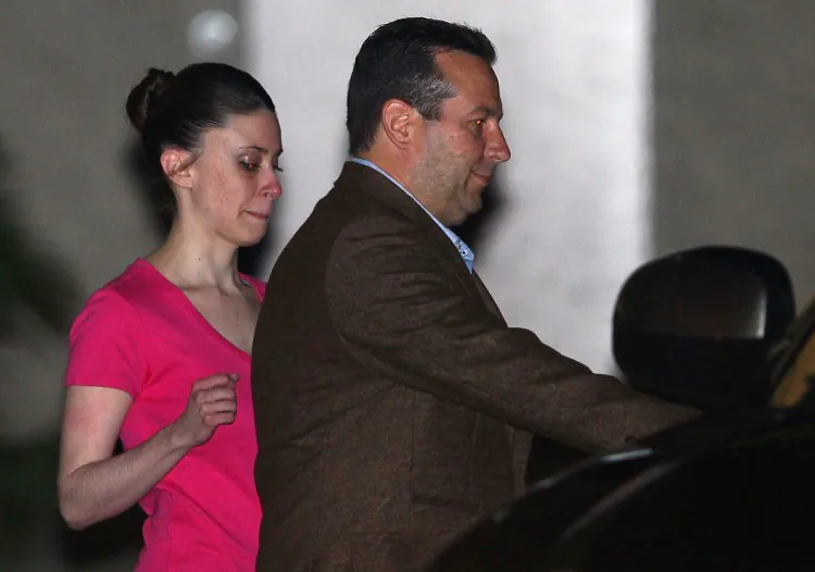 Casey Anthony (L) and her defense attorney Jose Baez leave the Booking and Release Center at the Orange County Jail after she was acquitted of murdering her daughter Caylee Anthony on July 16, 2011, in Orlando, Fla. Anthony has a court appointment on March 4 to answer questions about her bankruptcy claim. (Mark Wilson/Getty Images)