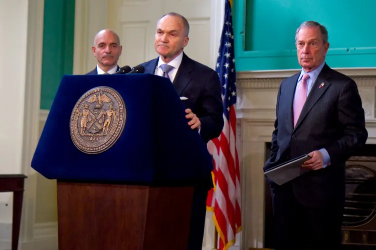 Police Commissioner Raymond Kelly (C) speaks at a press conference with NYC Mayor Michael Bloomberg (R) along with Fire Commissioner Salvatore Cassano (L) in New York on Dec 28. (Benjamin Chasteen/The Epoch Times)