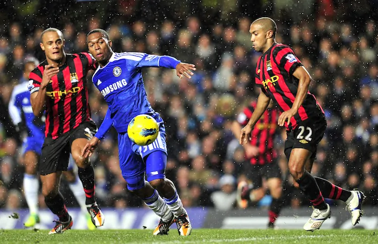 Chelsea's English striker Daniel Sturridge (C) vies with Manchester City's French defender Gael Clichy (R) and Belgian defender Vincent Kompany (L) during their English Premier League football match at Stamford Bridge on Monday. (Glyn Kirk/AFP/Getty Images)