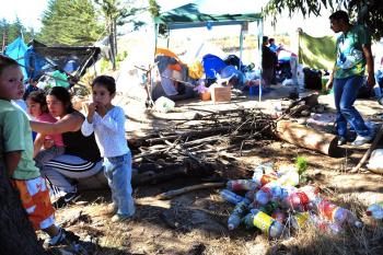 People in a refugee camp in the outskirts of Constitucion, some 300km south of Santiago. Chile experienced another round of aftershocks Thursday morning registering as high as 6.9 on the Richter scale. (Martin Bernetti/AFP/Getty Images) People in a refugee camp in the outskirts of Constitucion, some 300km south of Santiago. Chile experienced another round of aftershocks Thursday morning registering as high as 6.9 on the Richter scale. (Martin Bernetti/AFP/Getty Images)