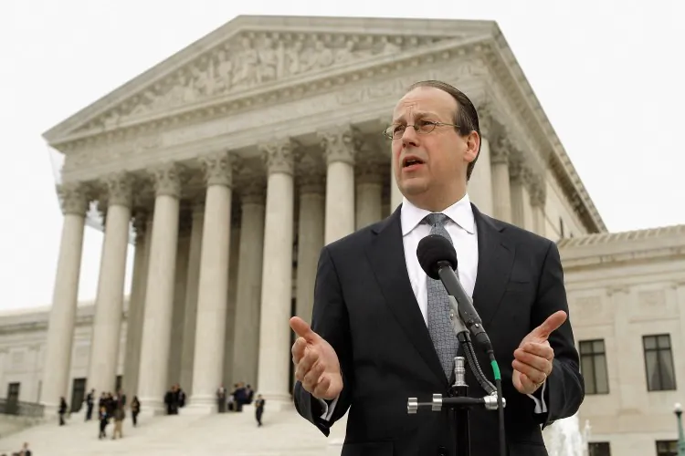 Paul Clement, the attorney representing the 26 states challenging the Patient Protection and Affordable Care Act, talks to the news media outside the U.S. Supreme Court on the third day of oral arguments over the constitutionality of the act, March 28 in Washington, D.C. (Chip Somodevilla/Getty Images)