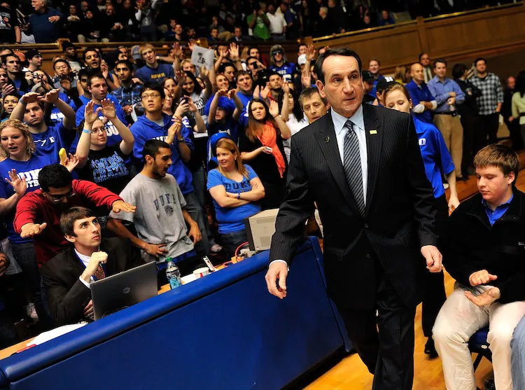 Mike Krzyzewski's (in suit) team lost for the second time in three games at home. (Grant Halverson/Getty Images)