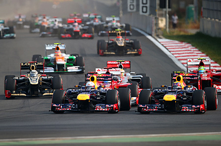 Sebastian Vettel (L) and Mark Webber (R) contest the third corner of Korea's Yeongam circuit on the first lap of the Korean Grand Prix. (Clive Mason/Getty Images)