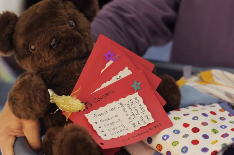 One gift idea is to create a book of coupons for services or meals you will provide the new parents. (Cat Rooney/The Epoch Times)