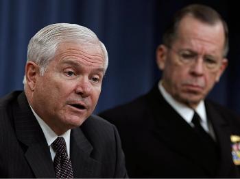 BUDGET CUT: Secretary of Defense Robert Gates (L) and Chairman of the Joint Chiefs of Staff Adm. Mike Mullen deliver remarks about the FY2011 Defense Budget Proposal at the Pentagon earlier this year. Budget cuts are forcing defense contractors such as Lockheed Martin to slash its workforce to cut costs. (Chip Somodevilla/Getty Images)