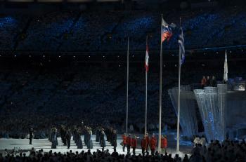 Royal Canadian Mounted Police stand before the Canadian, Russian, and Greek flags during the Closing Ceremony. (Mathew Little/The Epoch Times) Royal Canadian Mounted Police stand before the Canadian, Russian, and Greek flags during the Closing Ceremony. (Mathew Little/The Epoch Times)