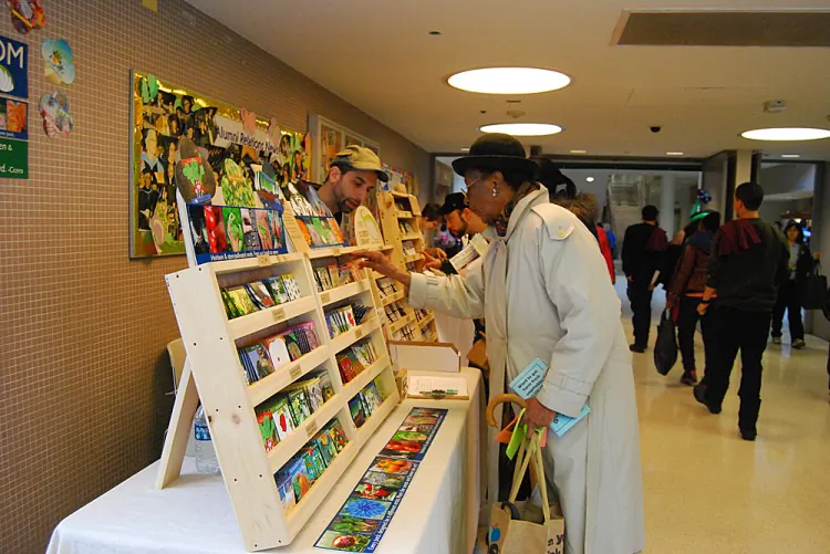 Grow NYC gives out seeds at the 28th Annual GreenThumb GrowTogether convention on Saturday in the Hostos Community College in the Bronx. (Catherine Yang/The Epoch Times)