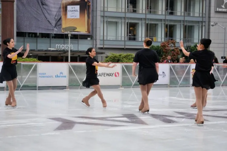 Ice skaters from the San Francisco Yerba Buena Ice Skating Center perform to a song from Disney's "The Lion King" at the opening ceremony of the Union Square Holiday Ice Rink in San Francisco on Nov. 7, 2012. (Mark Cao/The Epoch Times)
