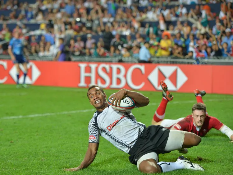 Hat-trick on ... Osea Kolinisau scores his second try as Fiji steam-roll Wales in the second half of the Cup Final of the Cathay Pacific/HSBC Hong Kong Sevens on Sunday March 24. (Bill Cox/The Epoch Times)