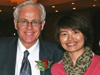 MP Bob Dechert and Xinhua reporter Shi Rong in an undated photo sent to government and media contacts from Shi's email account last week.