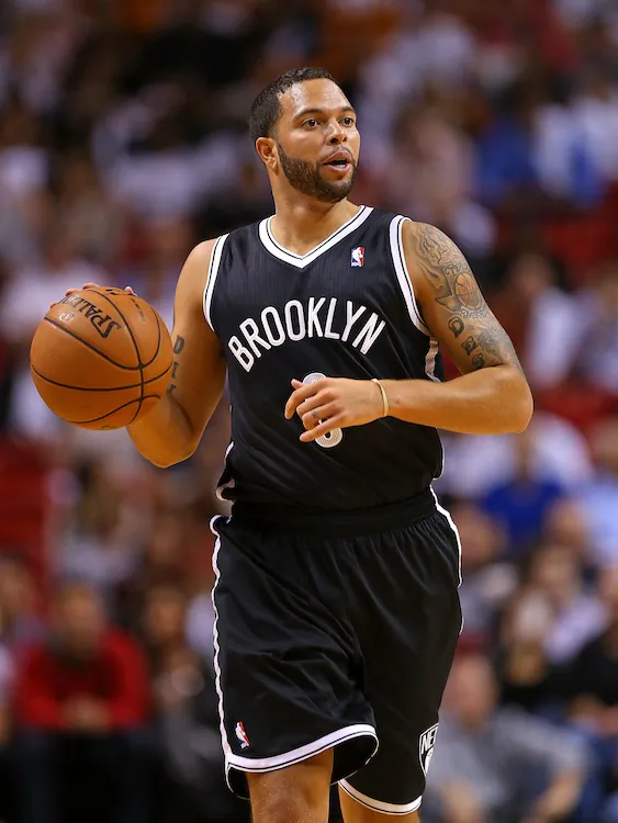 Deron Williams (file photo) scored 17 points in Sunday's win. (Mike Ehrmann/Getty Images)