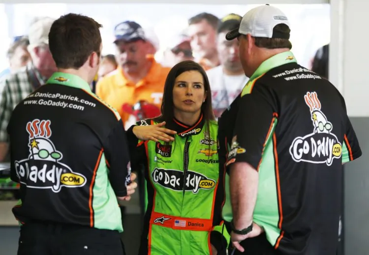 Danica Patrick, driver of the No. 34 GoDaddy.com Chevrolet, and her crew at the NASCAR Nationwide Series DRIVE4COPD 300 at Daytona International Speedway in Daytona Beach, Fla., on Feb. 22. Patrick qualified fastest and ran up front all day, but failed to make her move in the final lap of the NASCAR Sprint Cup Daytona 500 and got left behind. (Sam Greenwood/Getty Images)
