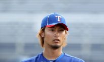 Darvish Fans Three in Debut