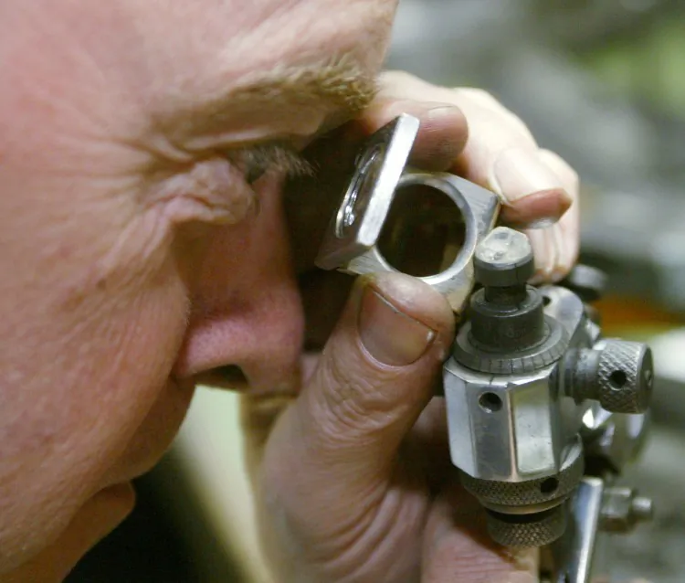 A stock photo of a diamond polisher in Antwerp, Belgium. One of the largest diamond heists in history took place at the Brussels International Airport on Feb. 18, 2013, which could have a negative impact on Antwerp's position as global diamond trade hub. (Mark Renders/Getty Images)