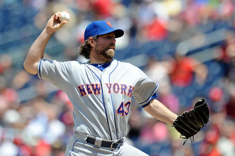 Mets starter R.A. Dickey won his MLB-leading ninth game of the season. (Patrick McDermott/Getty Images)