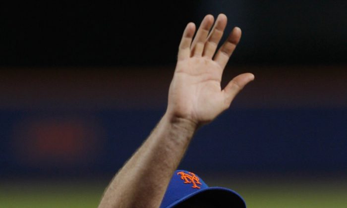 R.A. Dickey has pitched his last game for the Mets. (Mike Stobe/Getty Images)
