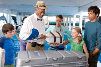 (L-R) Nathan Gamble, Morgan Freeman, Austin Highsmith, Cozi Zuehlsdorff, and Harry Connick Jr. viewing a prosthetic tail that may help to save a dolphin's life in the drama 'Dolphin Tale.' (Jon Farmer/Warner Bros. Pictures) (L-R) Nathan Gamble, Morgan Freeman, Austin Highsmith, Cozi Zuehlsdorff, and Harry Connick Jr. viewing a prosthetic tail that may help to save a dolphin's life in the drama 'Dolphin Tale.' (Jon Farmer/Warner Bros. Pictures)