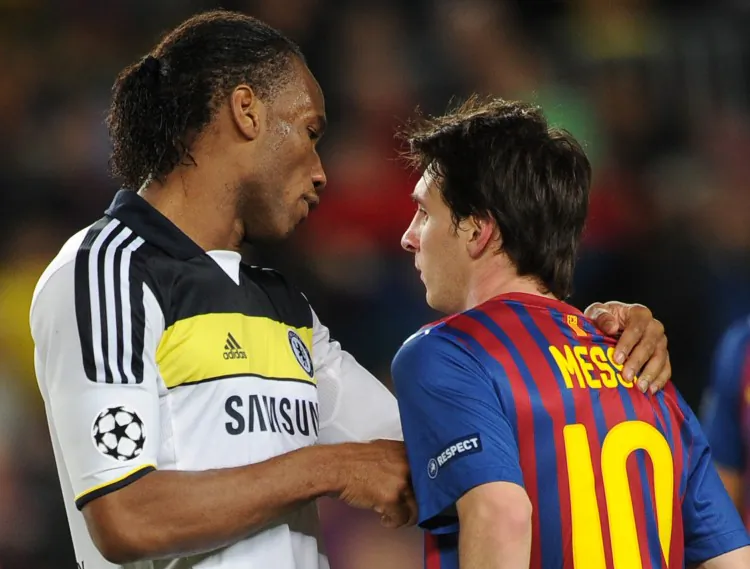 Chelsea’s Didier Drogba shakes hands with Barcelona’s Lionel Messi after Tuesday’s Champions League semifinal second leg match. (Lluis Gene/AFP/Getty Images)