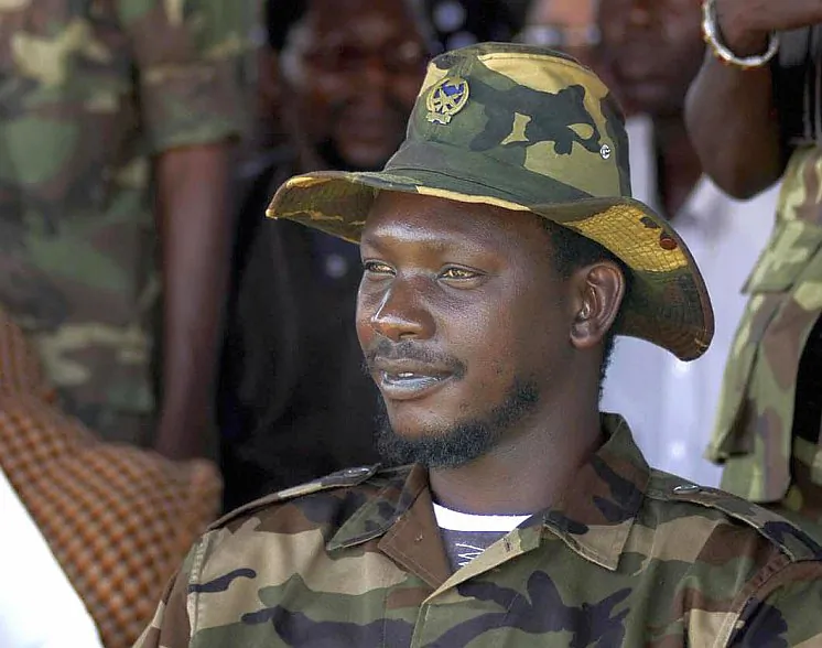 Congolese militia leader Thomas Lubanga Dyilo is seen at a rally in Bunia, DR Congo, on June 3, 2003. Lubanga was found guilty of conscripting and enlisting child soldiers by the International Criminal Court on March 14. (Gianluigi Guercia/AFP/Getty Images)