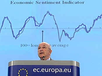 EU economic and monetary affairs commissioner Joaquin Almunia reports on the commission's bi-annual interim economic forecast at EU headquarters in Brussels on September 14, 2009. The European Union economy will shrink by four percent in 2009 but will climb out of recession in the third quarter, the European Commission forecasted. But the recovery from recession will be weighed down by rising unemployment and strained government finances. (John Thys/AFP/Getty Images)