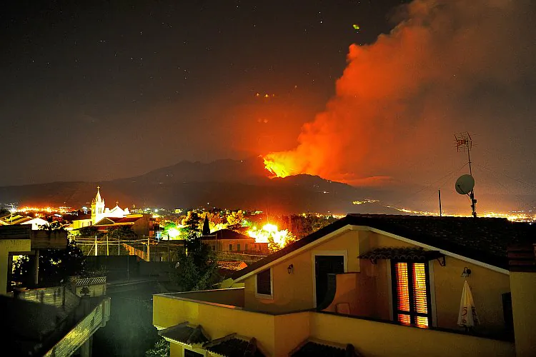 Lava spewed from a crater of the giant Mount Etna volcano in Catania in Sicily, Italy, on July 30, 2011. Mt. Etna erupted again on Jan. 5. (Marcello Paternostro/AFP/Getty Images)