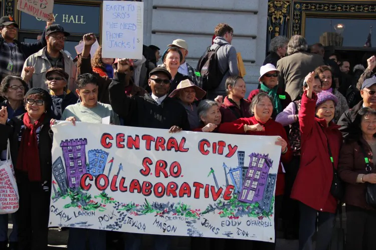 Activists from the Central City SRO Collaborative, SRO Families United Collaborative, and San Francisco Senior and Disability Action rally in front of City Hall on Feb. 4, 2013, demanding safer living standards in Single Room Occupancy Hotels for the elderly and people with disabilities. (Christian Watjen/The Epoch Times)
