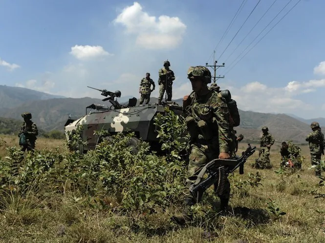Colombian soldiers are seen before leaving for the mountains in Caloto, Cauca department, Colombia, on July 21, during combat with FARC guerrillas. (Luis Robayo/AFP/GettyImages)