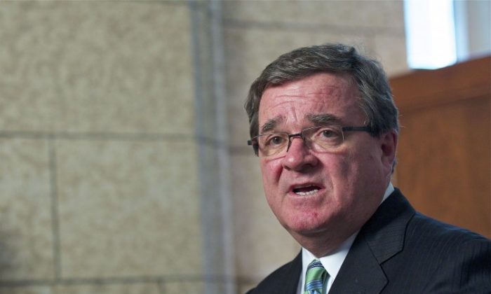 Oxfam is urging Finance Minister Jim Flaherty to champion a freeze on World Bank land deals in developing countries with poor protection for land rights. (Matthew Little/The Epoch Times)
