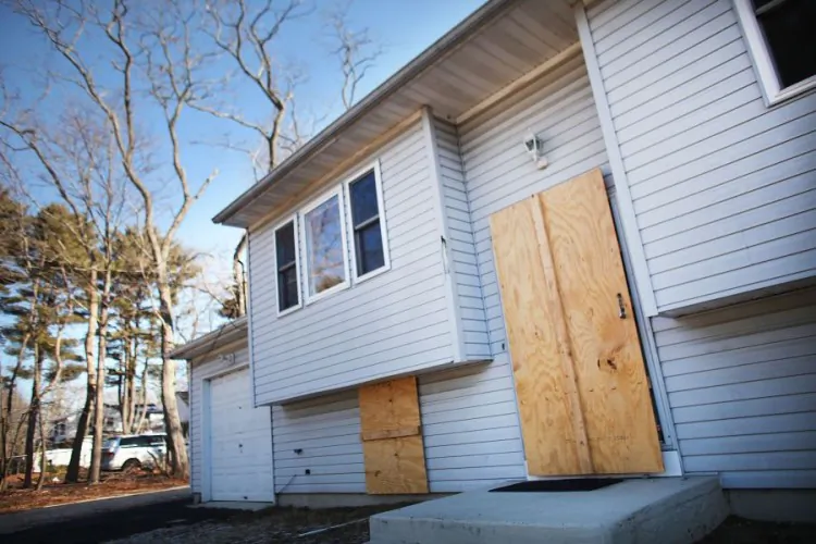 The United States saw a peak in foreclosed homes, like this one in Islip, N.Y., in 2010. But experts suggest that the number of foreclosures will rise again in 2012. (Spencer Platt/Getty Images)